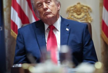 Trump signs business-friendlier version of AI executive order